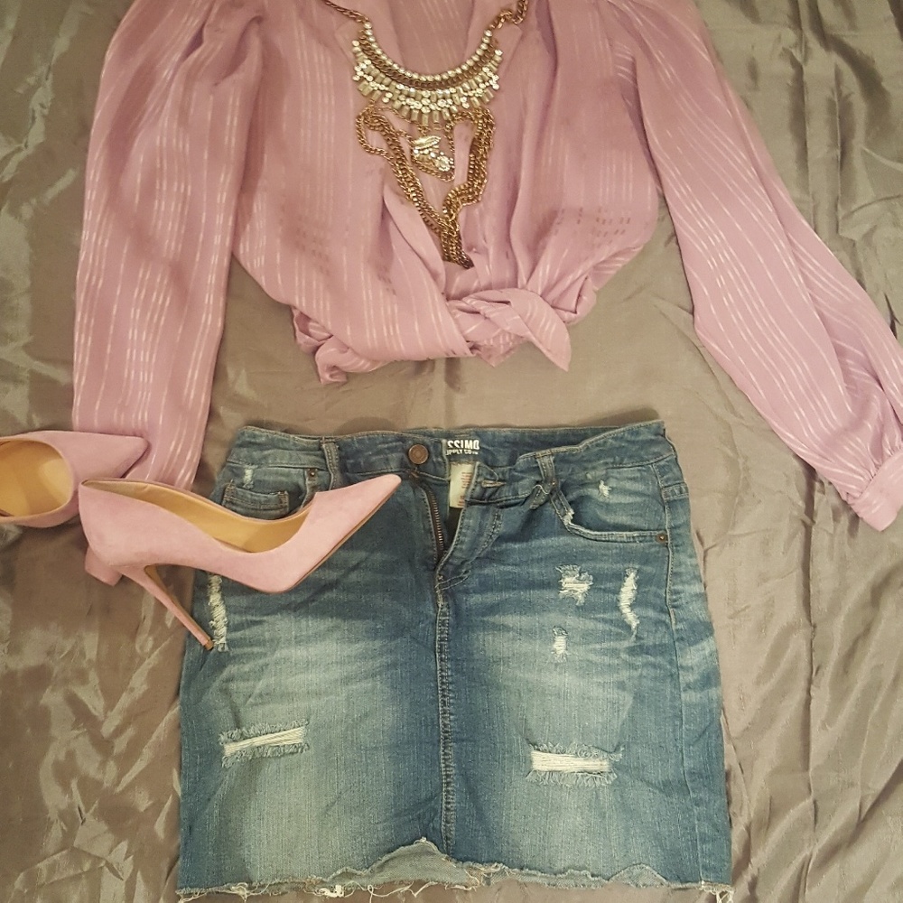 Distressed denim mini skirt